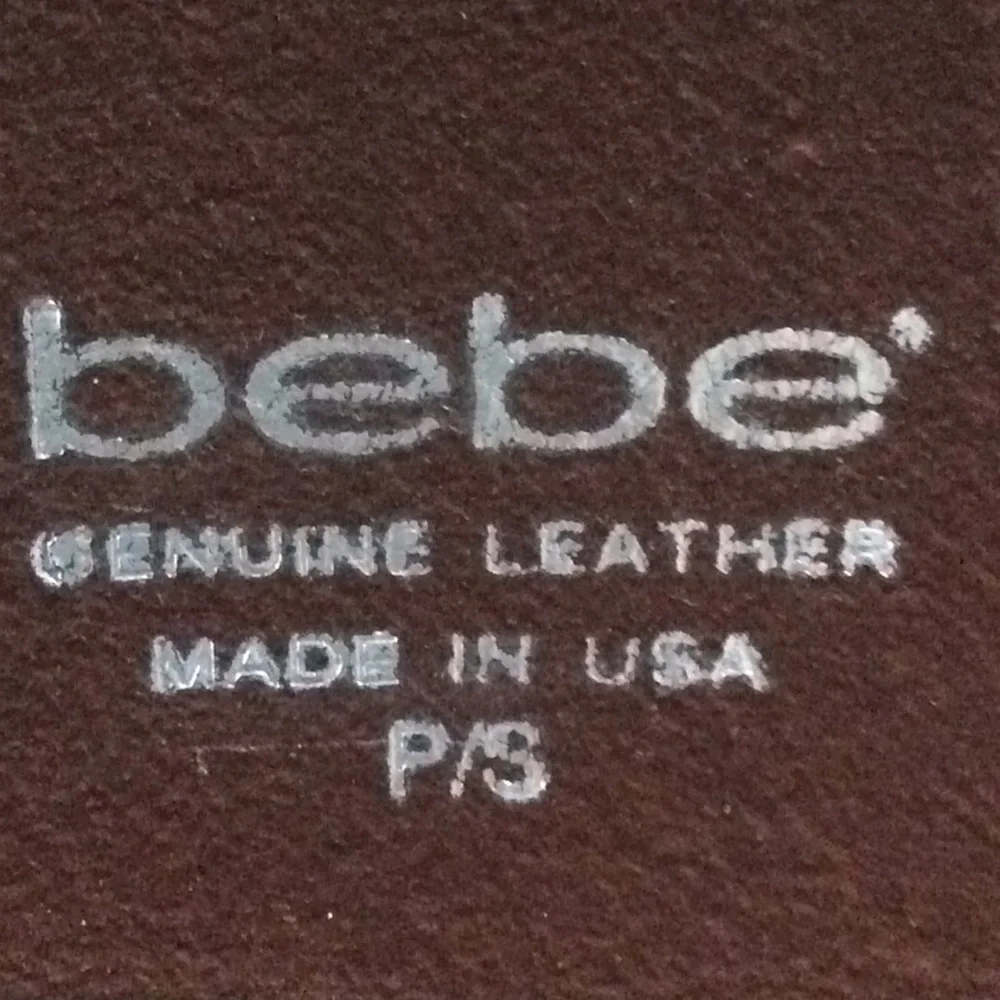 Bebe Leather Belt With grommets and rhinestones